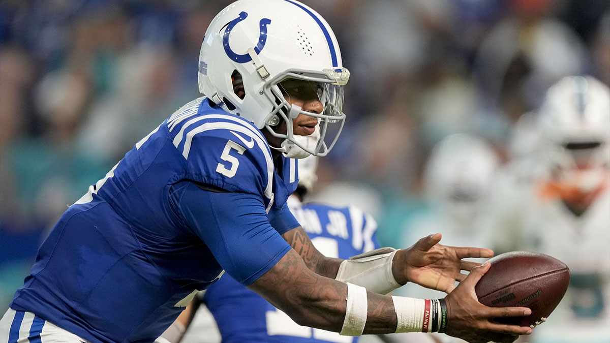 Indianapolis Colts quarterback Anthony Richardson (5) catches the snap during a game against the Miami Dolphins at Lucas Oil Stadium.