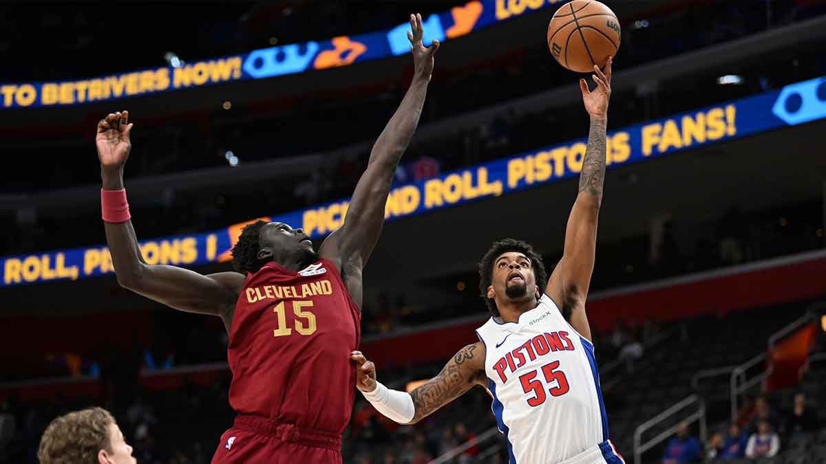 Detroit Pistons guard Aaron Estrada (55) shoots the ball over Cleveland Cavaliers forward JT Thor (15) in the third quarter at Little Caesars Arena.
