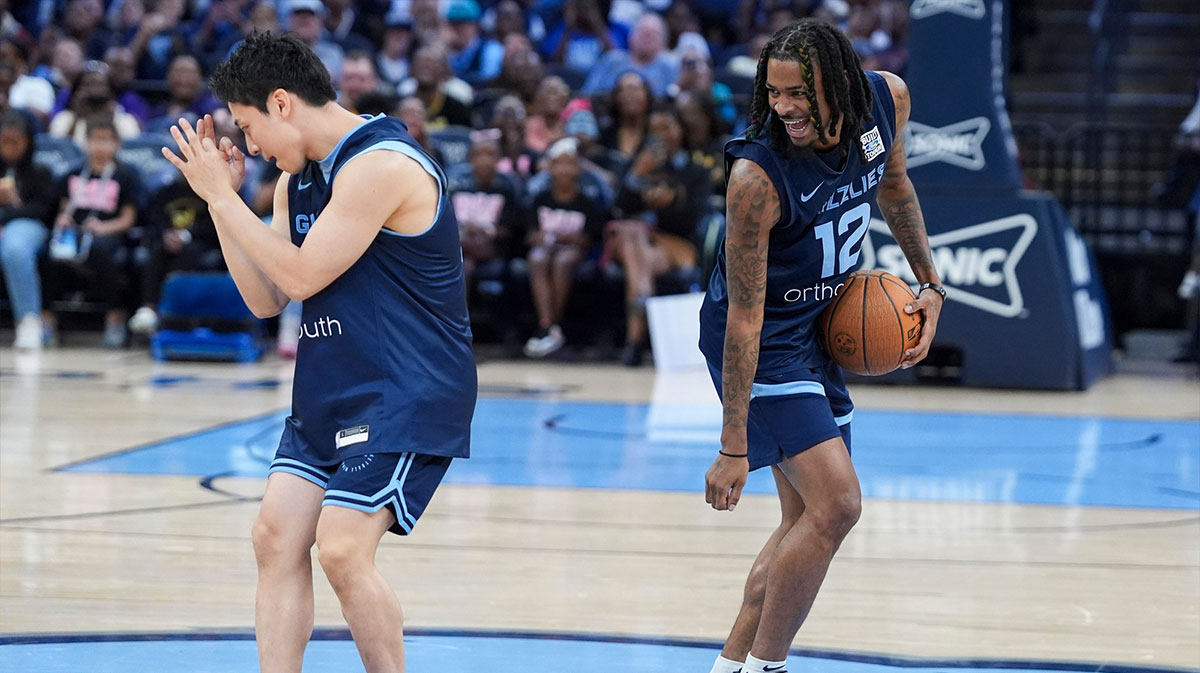 Grizzlies' Yuki Kawamura (17) and Ja Morant (12) do the griddy dance during open practice at FedExForum in Memphis, Tenn., on Sunday, October 6, 2024.