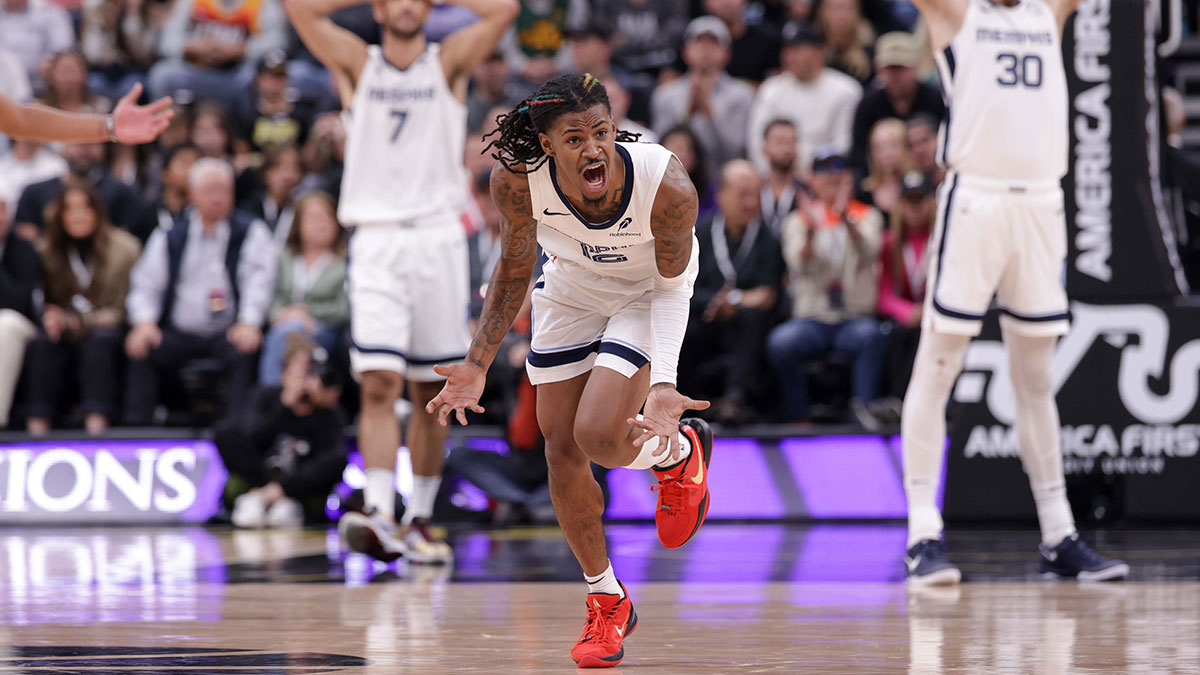 Memphis Grizzlies guard Ja Morant (12) reacts to being called for a foul during the second half against the Utah Jazz at Delta Center.