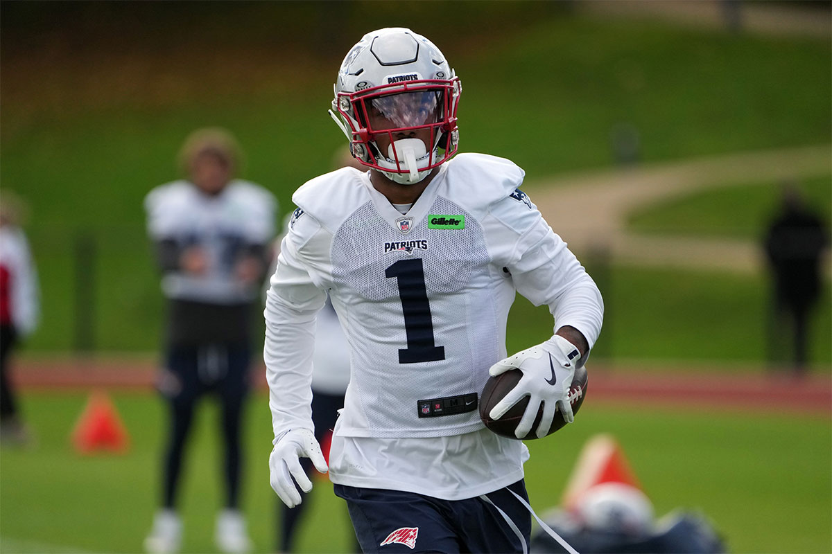 New England Patriots wide receiver Ja'Lynn Polk (1) carries the ball during practice at the Harrow School.