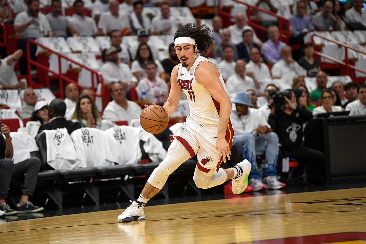 Miami Heat guard Jaime Jaquez Jr. (11) dribbles the ball during the first quarter of game four of the first round for the 2024 NBA playoffs at Kaseya Center.