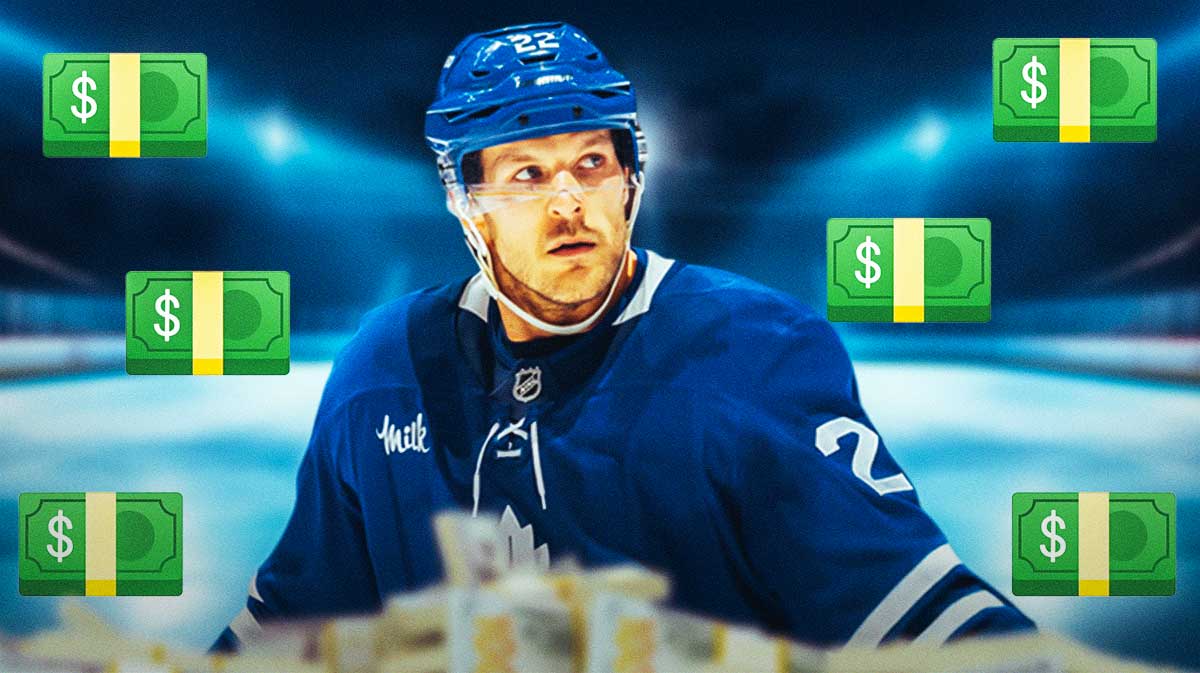 Jake McCabe surrounded by money emojis