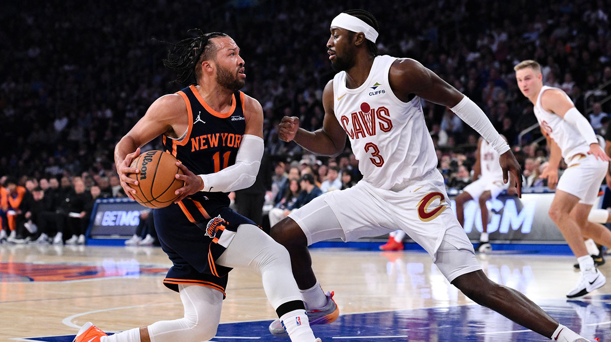 New York Knicks guard Jalen Brunson (11) drives to the basket against Cleveland Cavaliers guard Caris LeVert (3) during the first half at Madison Square Garden.