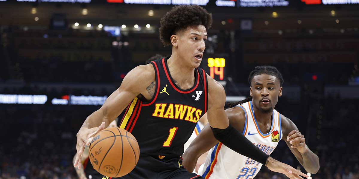 Atlanta Hawks forward Zaccharie Risacher (10) shoots over Oklahoma City Thunder forward Chet Holmgren (7) during the second quarter at Paycom Center.