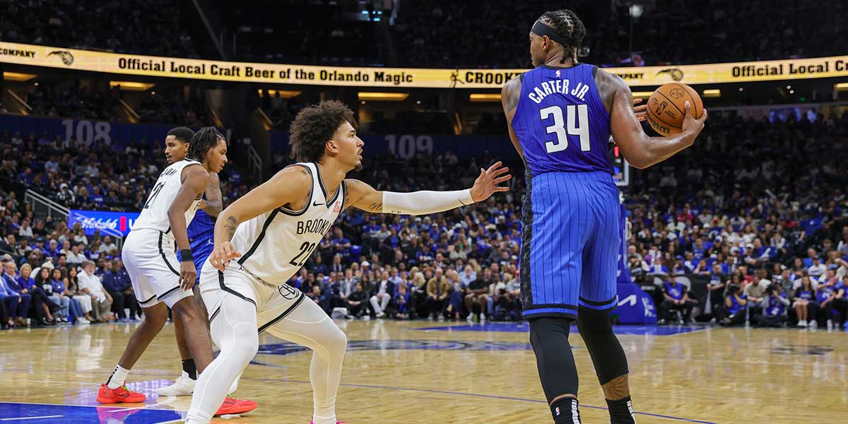 Brooklyn Nets forward Jalen Wilson (22) defends Orlando Magic center Wendell Carter Jr. (34) during the second half at Kia Center.