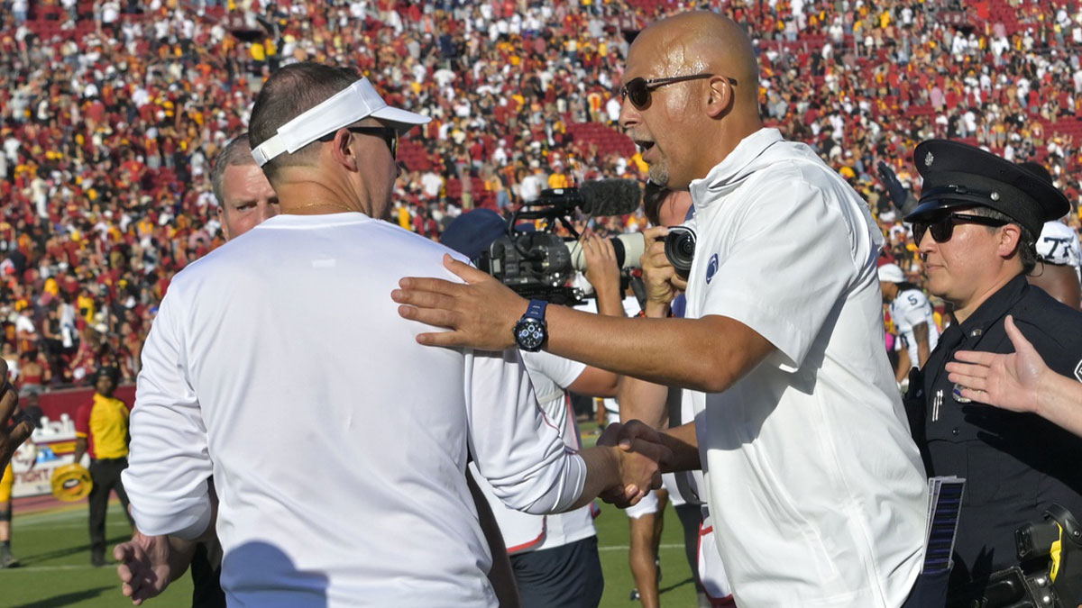 USC Trojans head coach Lincoln Riley shakes hands with Penn State Nittany Lions head coach James Franklin after the game at United Airlines Field at the Los Angeles Memorial Coliseum.
