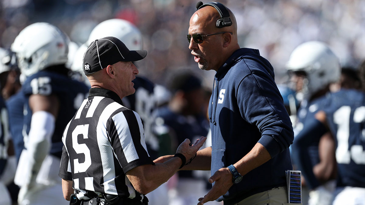 Penn State Nittany Lions head coach James Franklin talks with an official during the fourth quarter against the UCLA Bruins at Beaver Stadium.