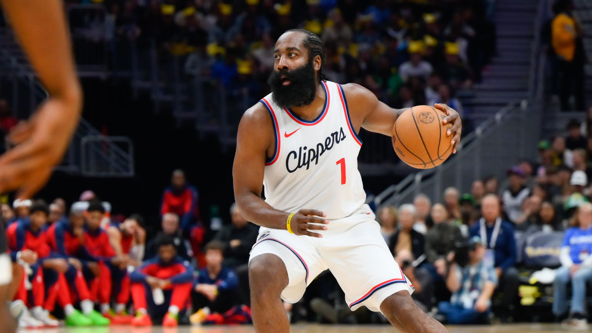 Los Angeles Clippers guard James Harden (1) dribbles the ball during the first half at Climate Pledge Arena.