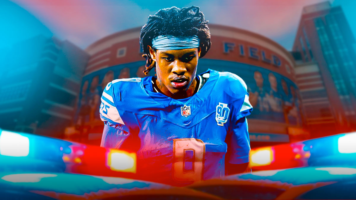 Lions WR Jameson Williams in front of Ford Field with a flashing police car
