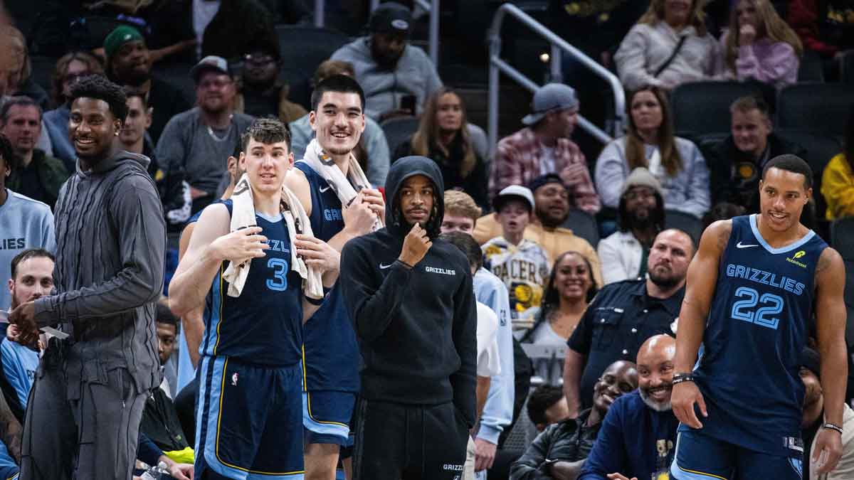 Memphis Grizzlies guard Ja Morant (12) and forward Jaren Jackson Jr. (13) standing at the bench in the second half against the Indiana Pacers at Gainbridge Fieldhouse. 