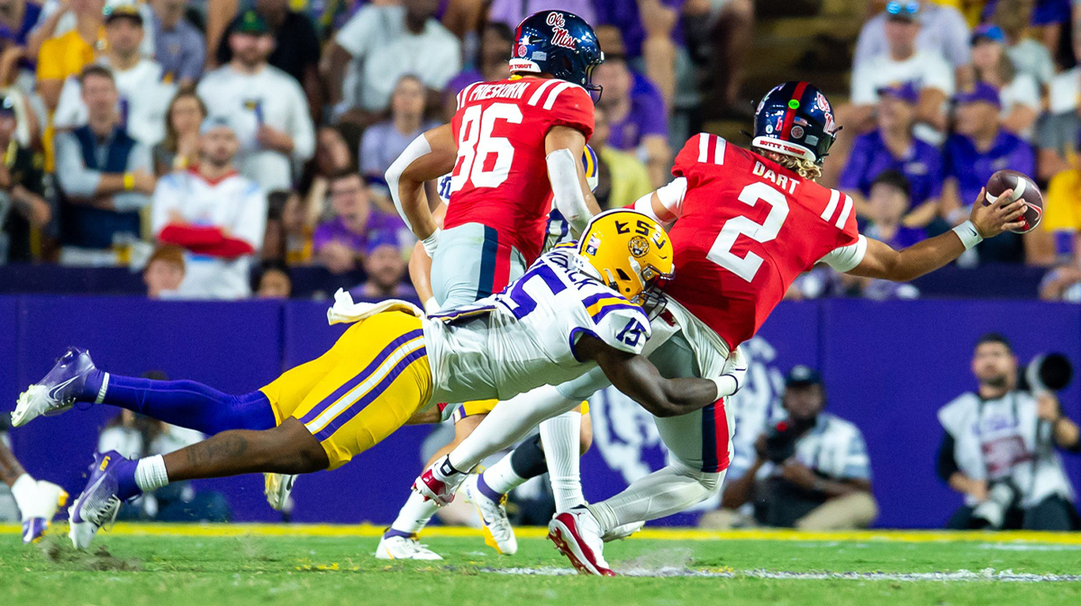 DeShawn Womack 15 tackles Jaxson Dart 2 as the LSU Tigers take on the Ole Miss Rebels at Tiger Stadium in Baton Rouge, LA. Saturday, Oct. 12, 2024.