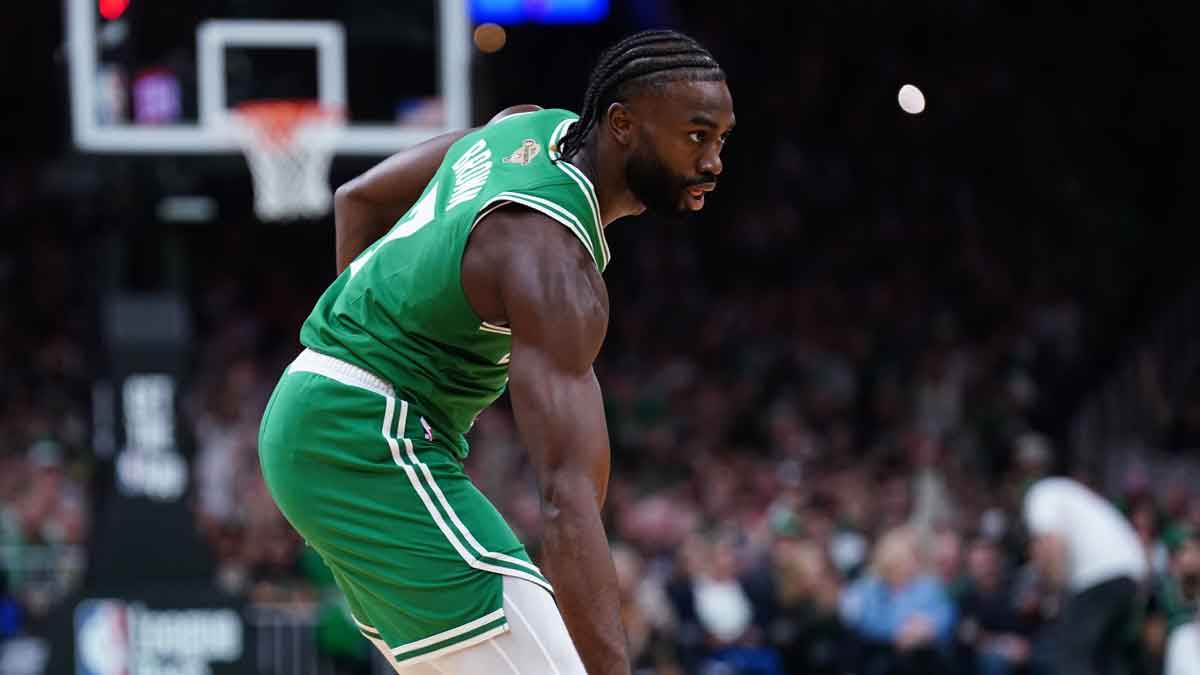 Boston Celtics guard Jaylen Brown (7) reacts after his three-pointer against the New York Knicks in the first quarter at TD Garden. 