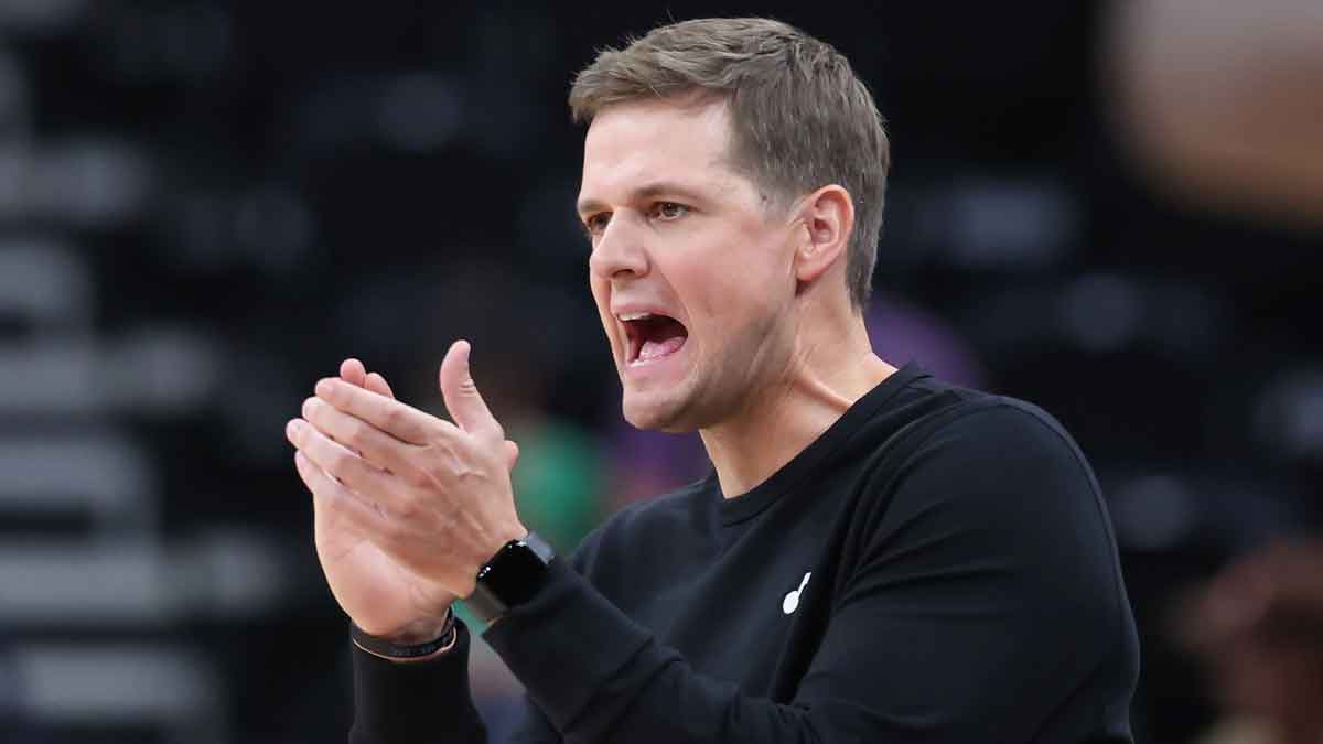 Utah Jazz head coach Will Hardy cheers on his team against the Houston Rockets during the second quarter at Delta Center.