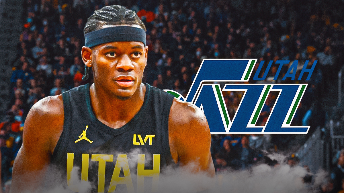 Jazz' Taylor Hendricks looks at Mavericks players after injury
