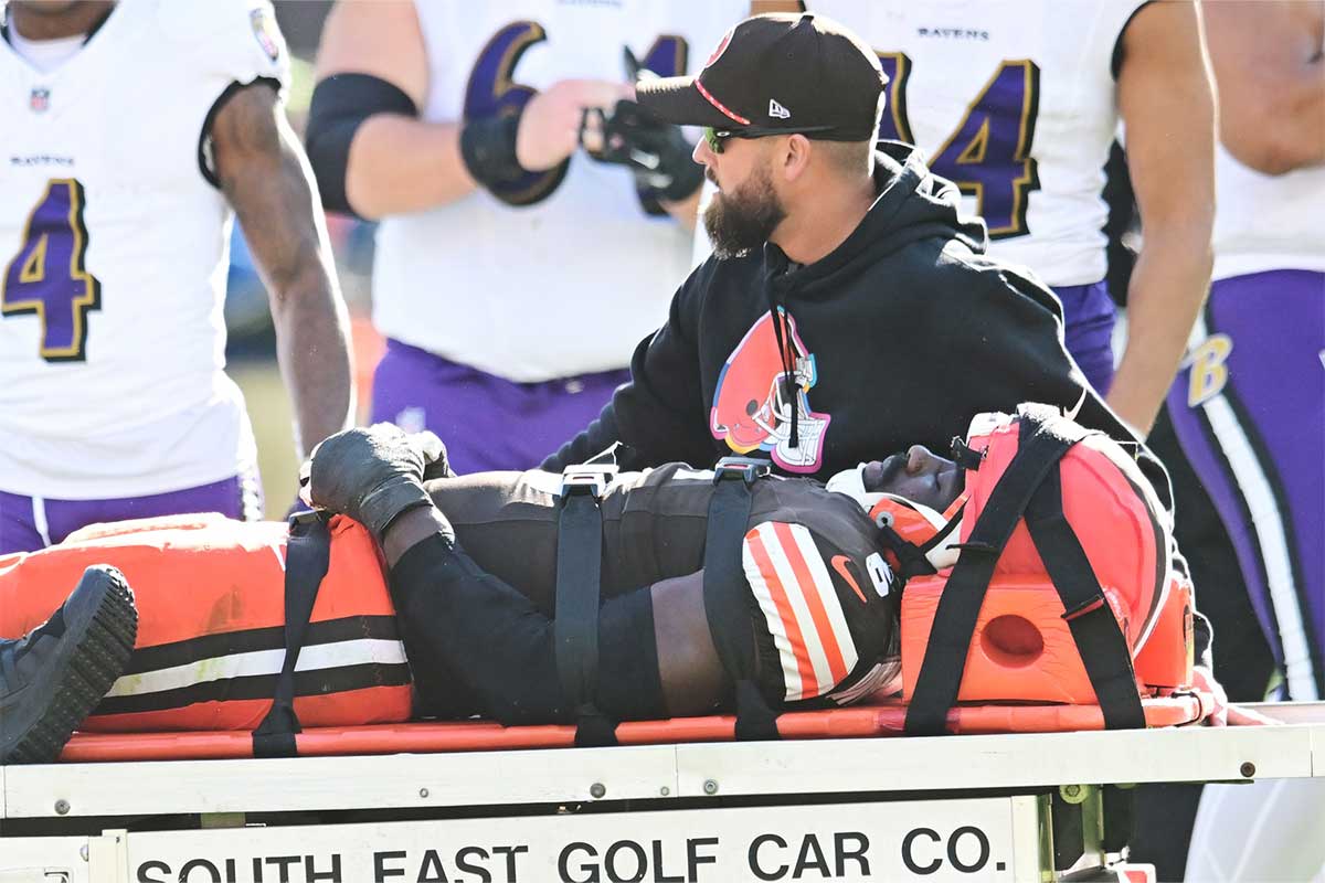 Cleveland Browns linebacker Jeremiah Owusu-Koramoah (6) is taken off the field with a neck injury during the second half against the Baltimore Ravens at Huntington Bank Field.