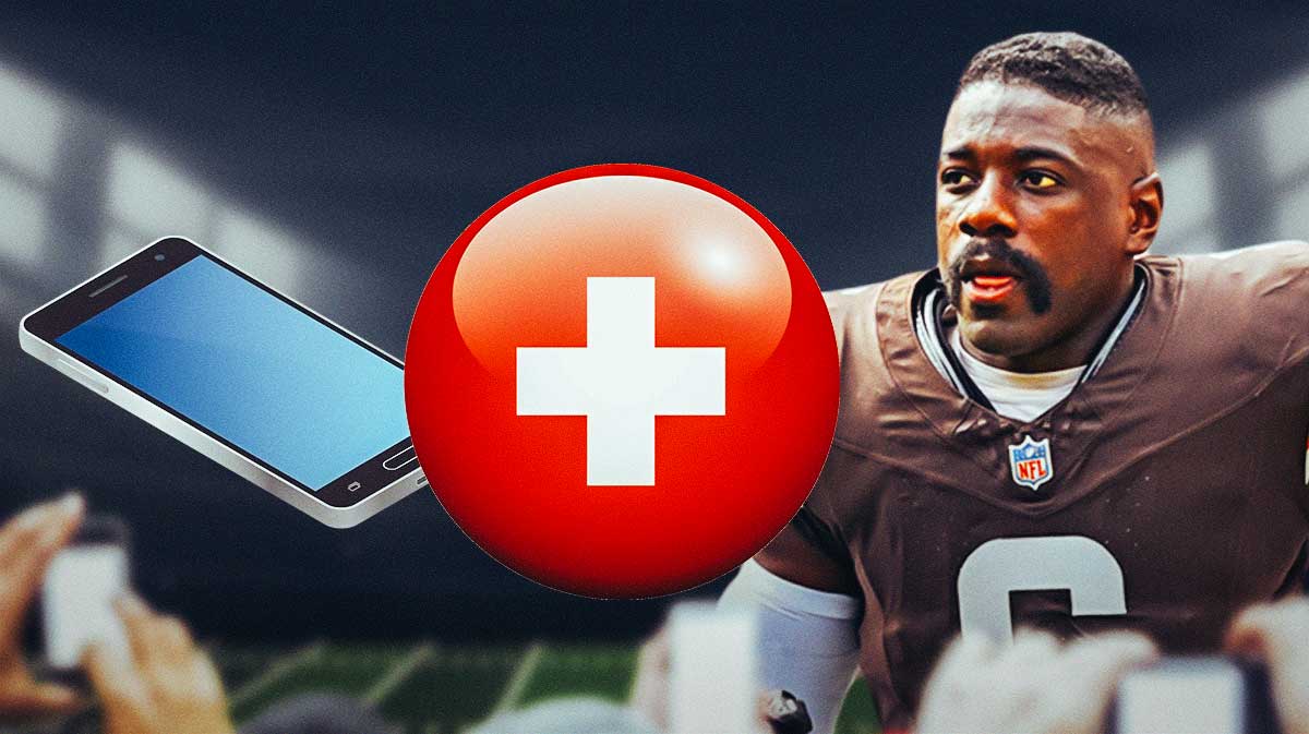 Browns Jeremiah Owusu-Koramoah with red cross and a cell phone