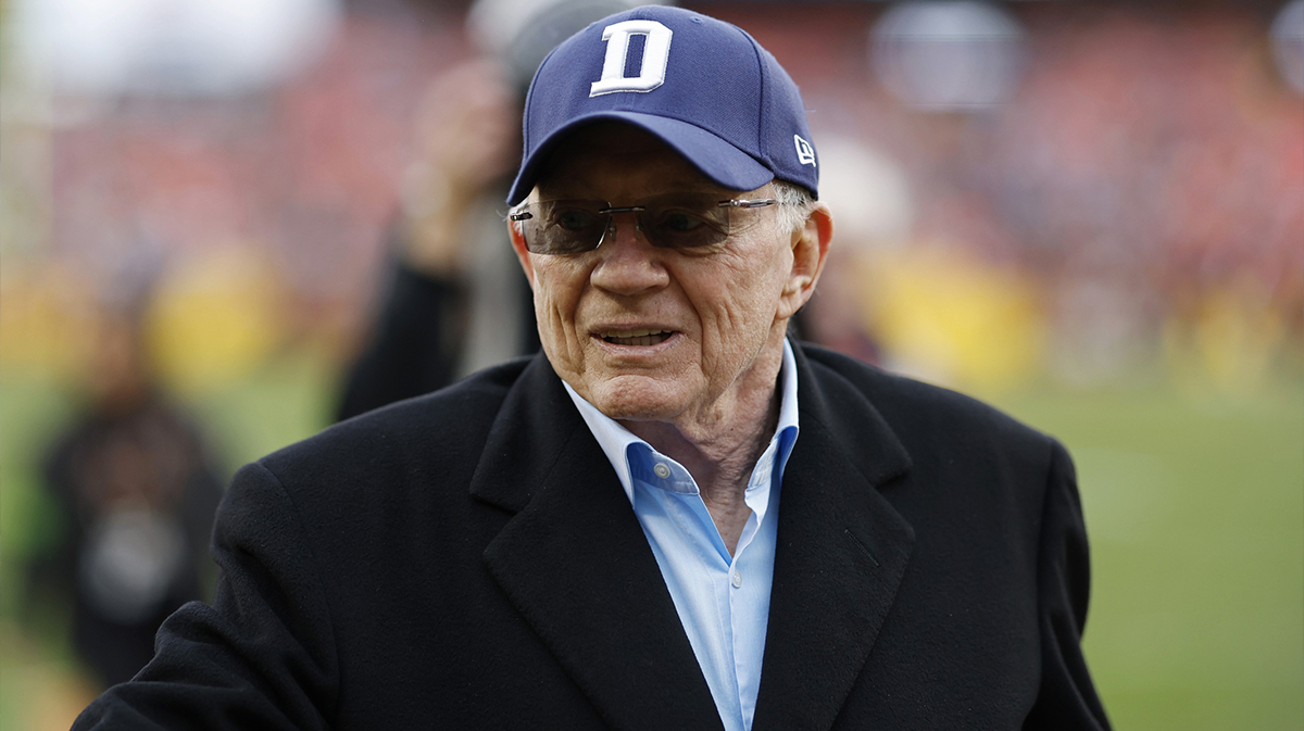 Dallas Cowboys owner Jerry Jones walks off the field after warmups prior to the game against the Washington Commanders at FedExField.