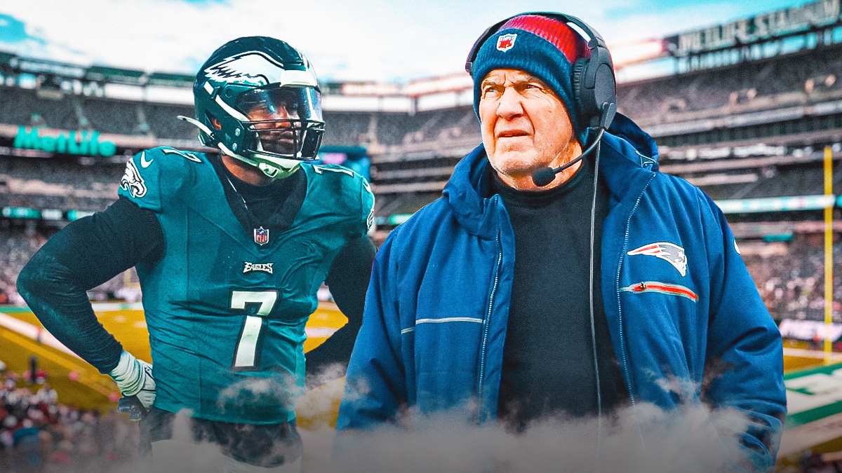 Bill Belichick next to Haason Reddick in front of the Jets stadium