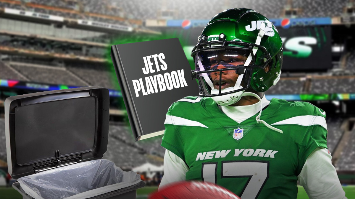Jets' Garrett Wilson next to a big trash can with a book in it labeled "JETS PLAYBOOK"