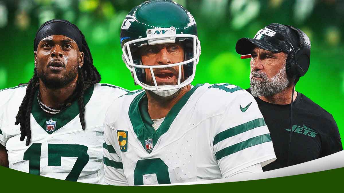 Aaron Rodgers and Davante Adams in New York Jets uniforms with coach Jeff Ulbrich in the background as Ulbrich discusses the connection Rodgers and Adams have as the duo and garrett wilson helped beat the texans in week 9.