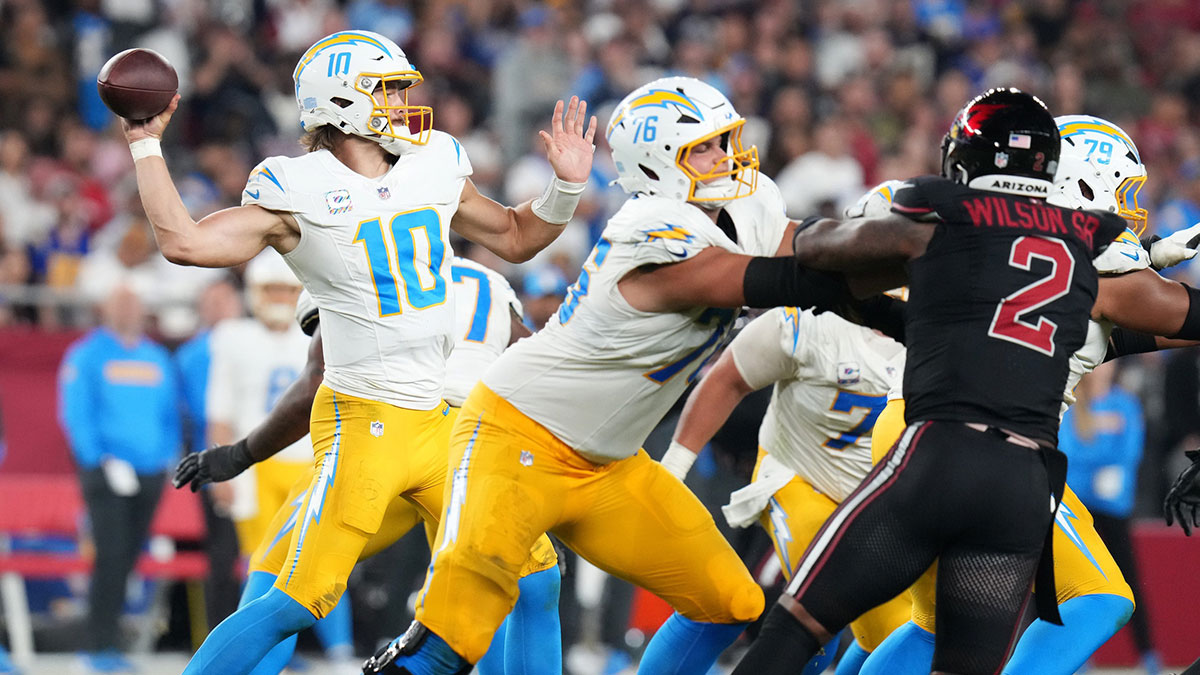 Los Angeles Chargers quarterback Justin Herbert (10) throws the ball against the Arizona Cardinals at State Farm Stadium.