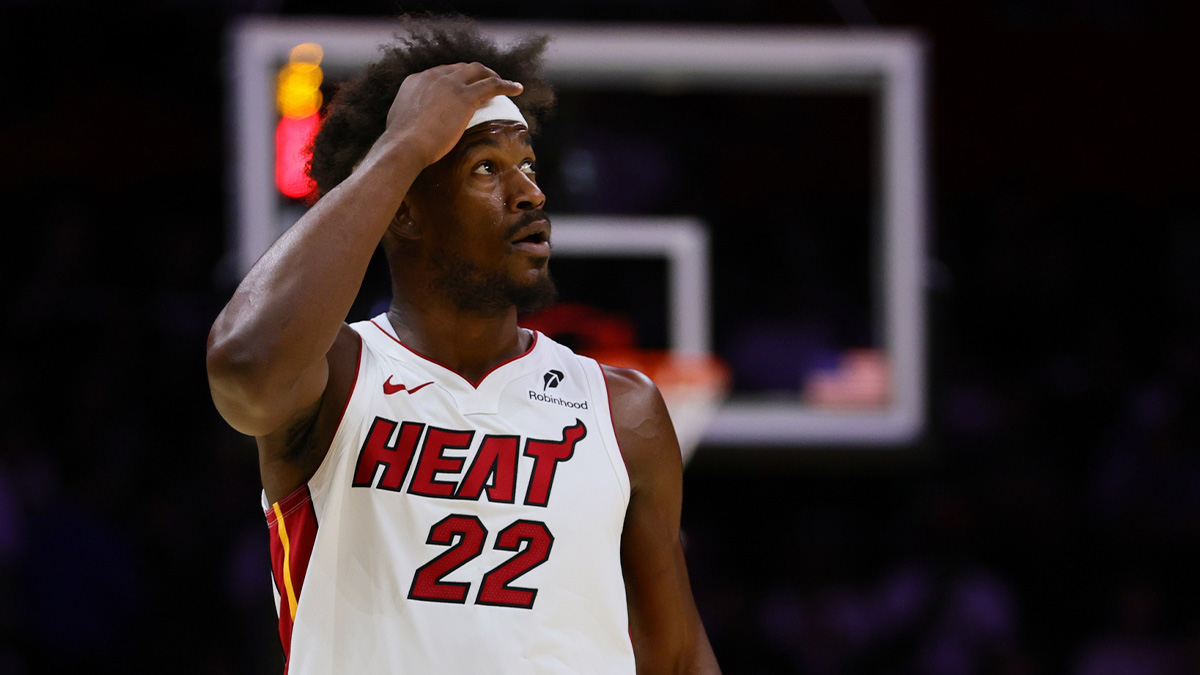 Miami Heat forward Jimmy Butler (22) looks on against the New Orleans Pelicans during the first quarter at Kaseya Center. 