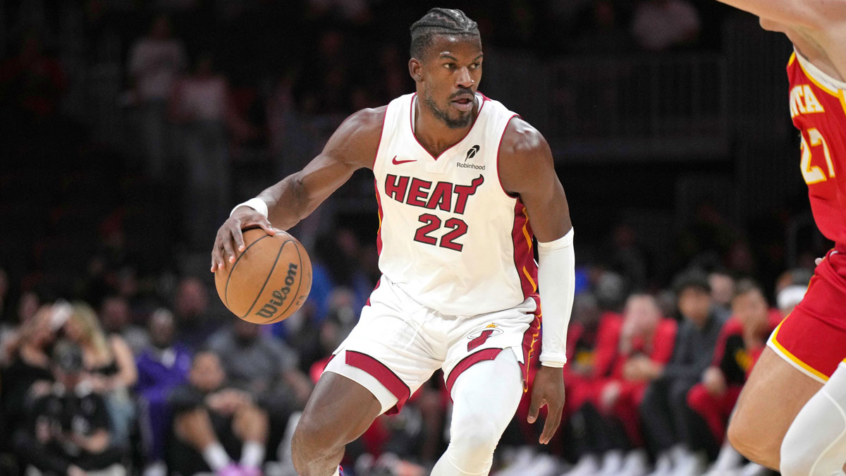 Miami Heat forward Jimmy Butler (22) drives the ball up court as Atlanta Hawks guard Whit Krejci (27) defends during the first half at the Cassia Center.