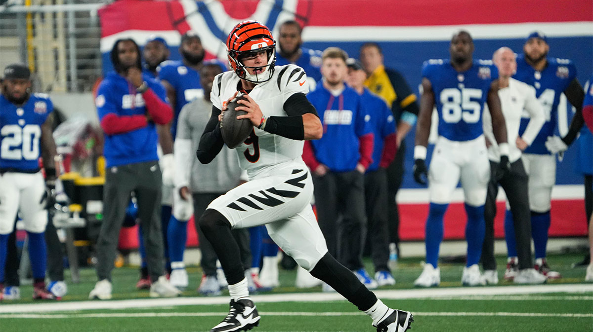 Bengals Joe Burrow (9) takes the ball down the field for a touchdown during their game against the Giants at MetLife Stadium on Sunday October 13, 2024. Bengals lead the game 7-0 at halftime.