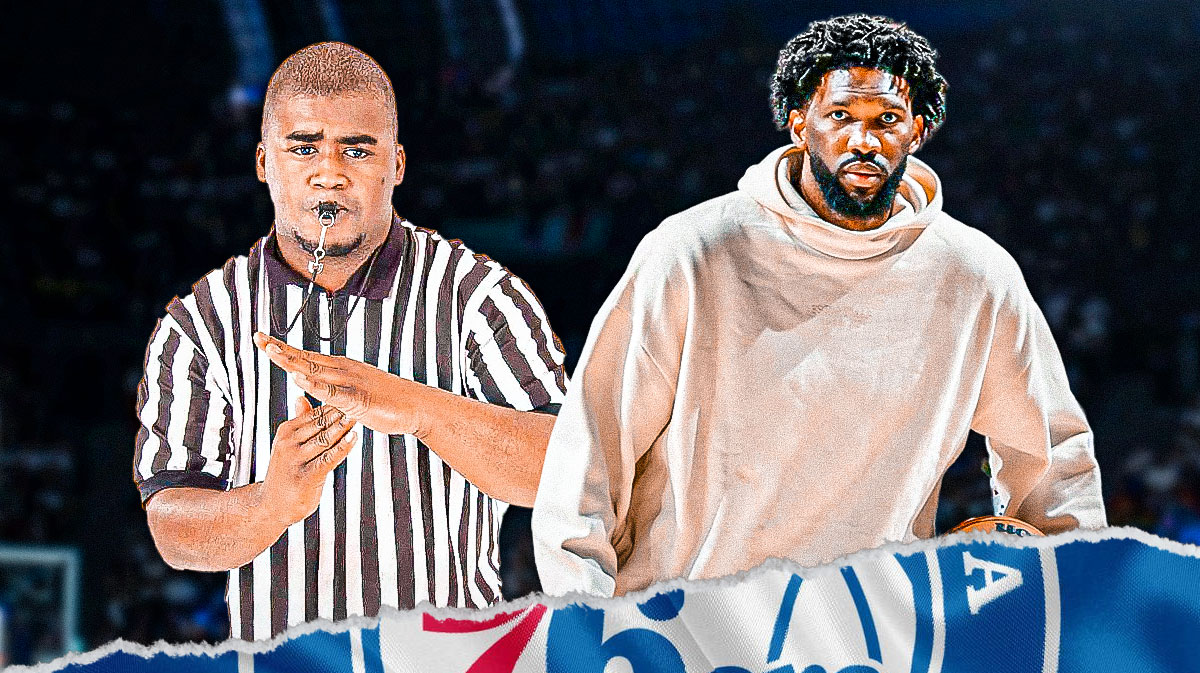 76ers star Joel Embiid with a referee giving him a tech