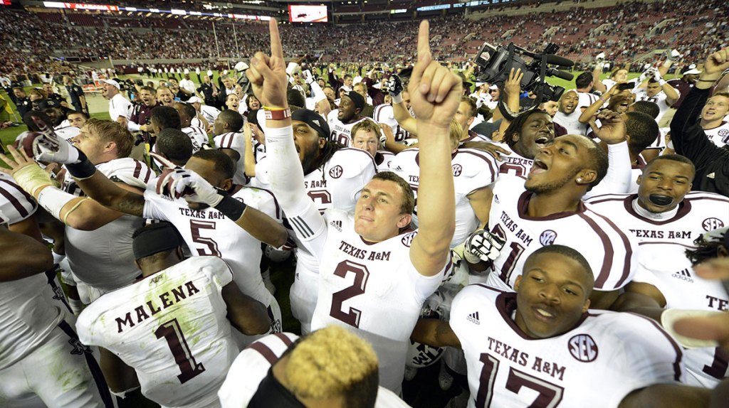 Texas A&M Aggies quarterback Johnny Manziel (2) celebrates their 29-24 victory over the Alabama Crimson Tide at Bryant Denny Stadium. Mandatory Credit: