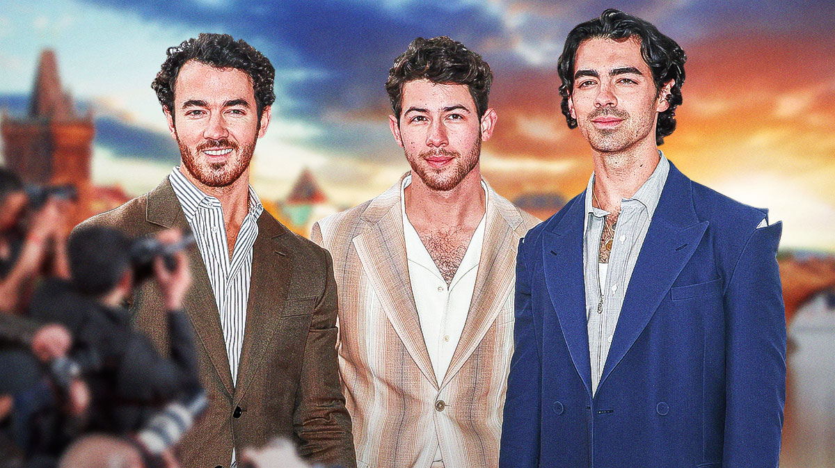 Kevin, Nick, and Joe Jonas, the Jonas Brothers, with Prague background where their Tour had a laser pointer incident.