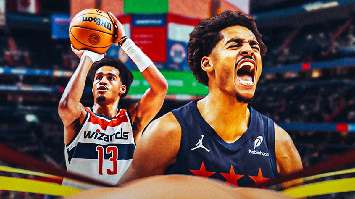 Jordan Poole shoots ball into basket