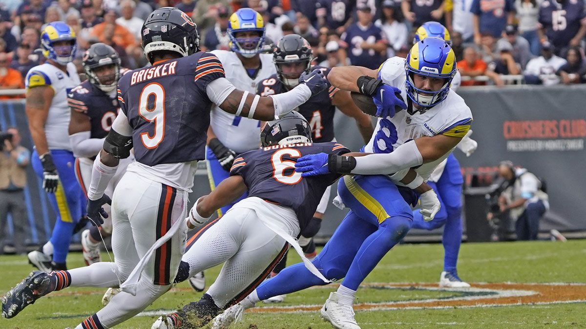Chicago Bears cornerback Kyler Gordon (6) tackles Los Angeles Rams wide receiver Jordan Whittington (88) during the second half at Soldier Field.