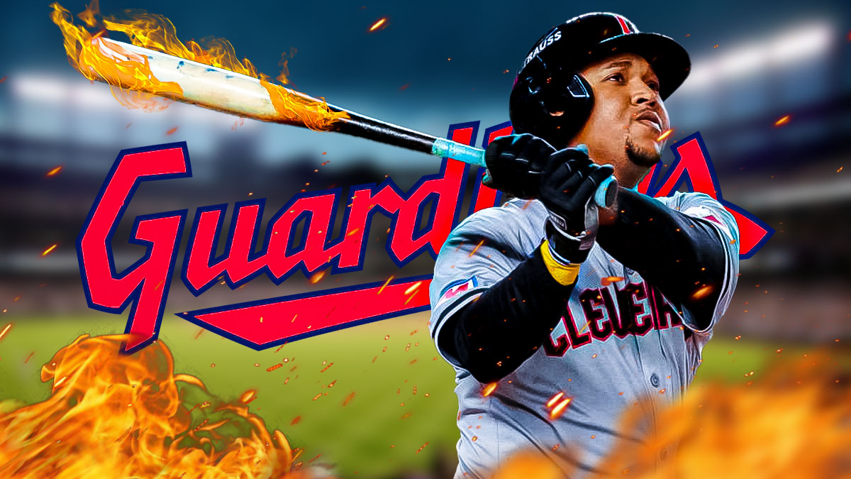 Guardians' Jose Ramirez swinging a bat made of fire