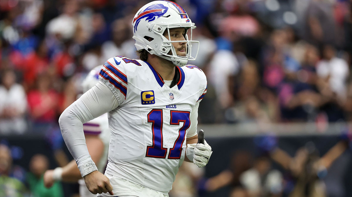 Buffalo Bills quarterback Josh Allen (17) runs off the field before the Bills punt to the Houston Texans in the fourth quarter at NRG Stadium.