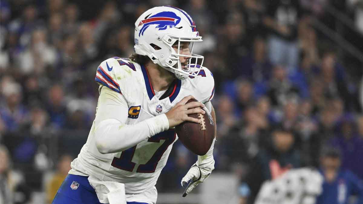 Buffalo Bills quarterback Josh Allen (17) rolls out to pass during the second half against the Baltimore Ravens at M&T Bank Stadium