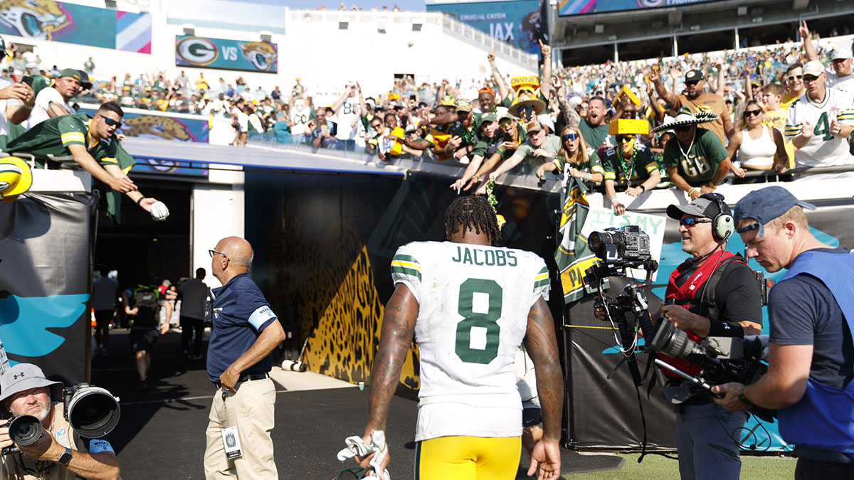 Green Bay Packers running back Josh Jacobs (8) enters the locker room after the game against the Jacksonville Jaguars at EverBank Stadium.
