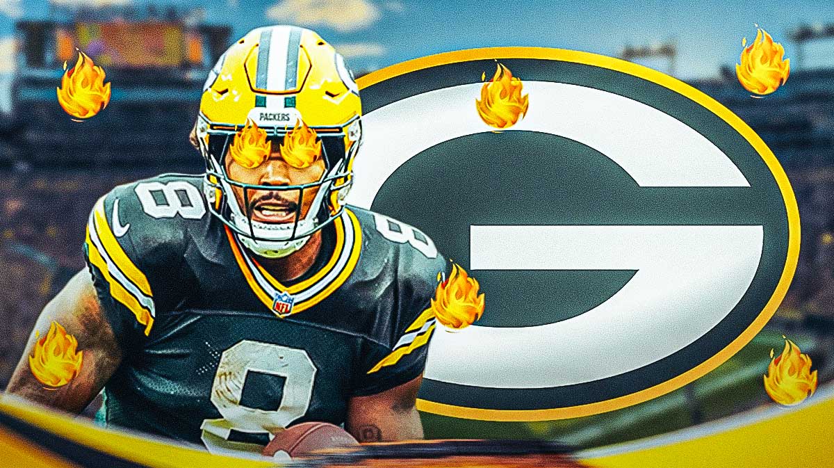 Packers' Josh Jacobs with fire in his eyes and surrounded by fire