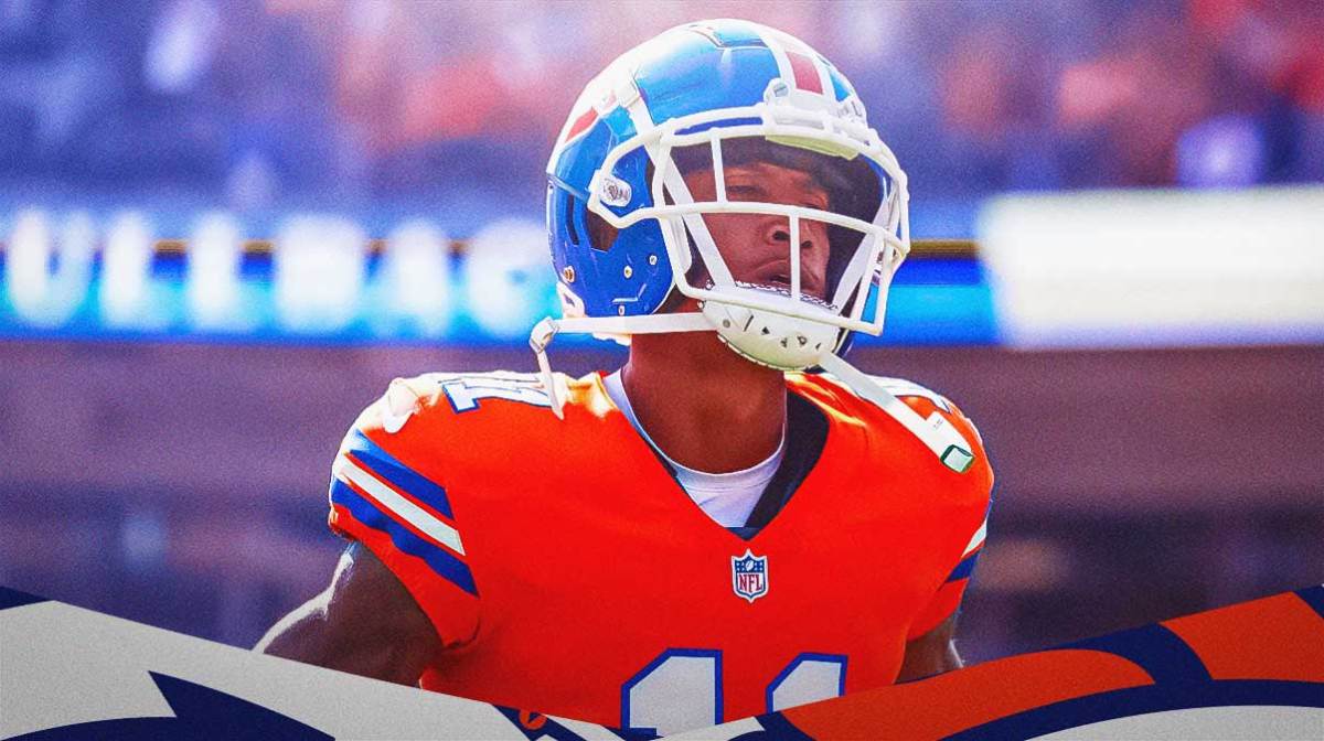 Broncos wide receiver Josh Reynolds next to the Broncos logo with the city of Denver in the background