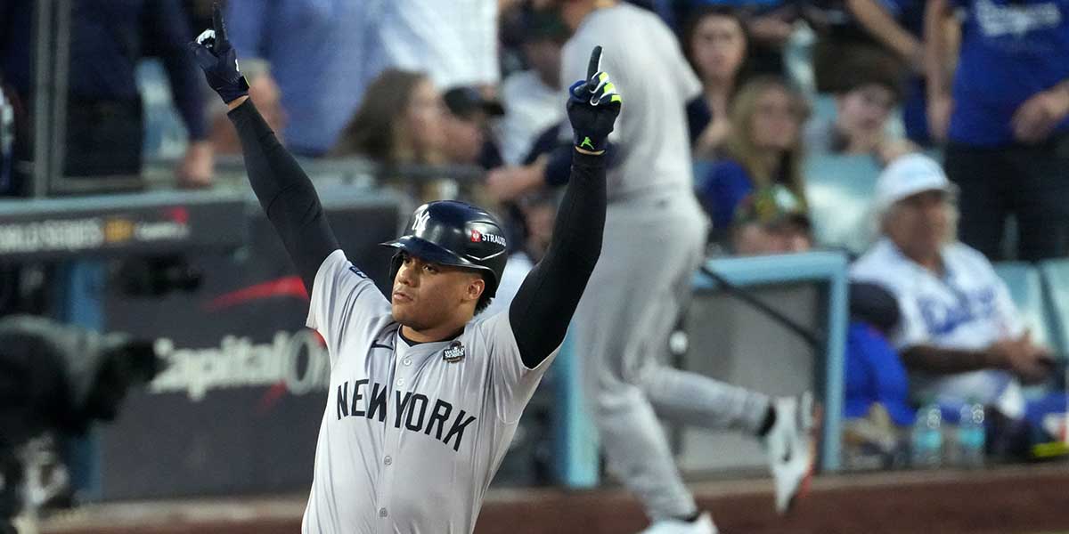 New York Yankees outfielder Juan Soto (22) reacts after hitting a home run against the Los Angeles Dodgers in the third inning for game two of the 2024 MLB World Series at Dodger Stadium.