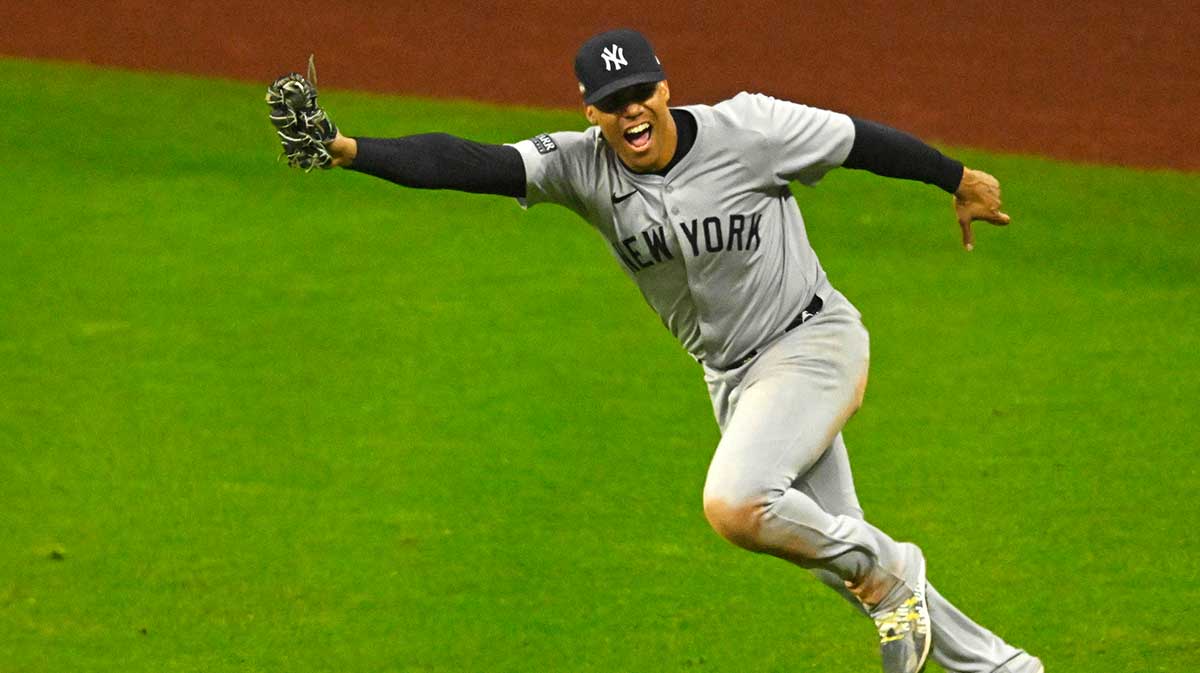 New York Yankees outfielder Juan Soto (22) makes the final out during the tenth inning to beat the Cleveland Guardians during game five of the ALCS for the 2024 MLB playoffs at Progressive Field.