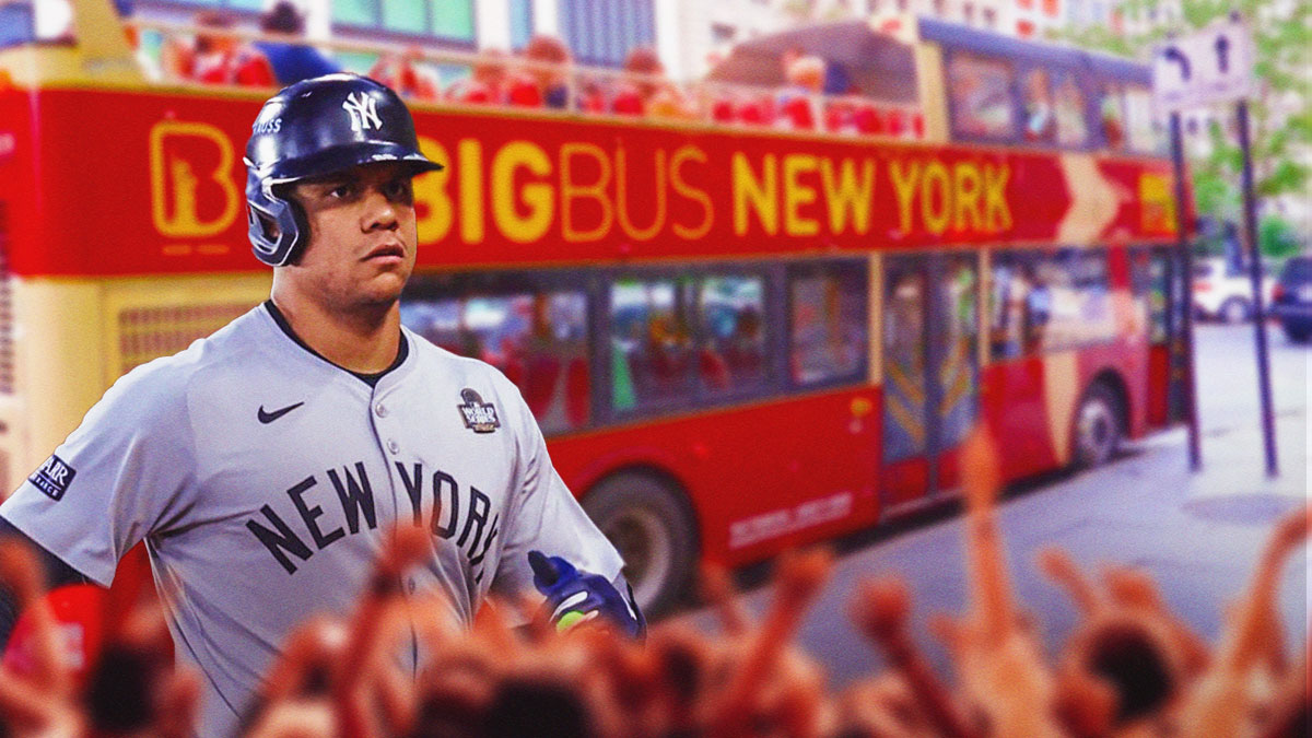 juan soto in front of a bus