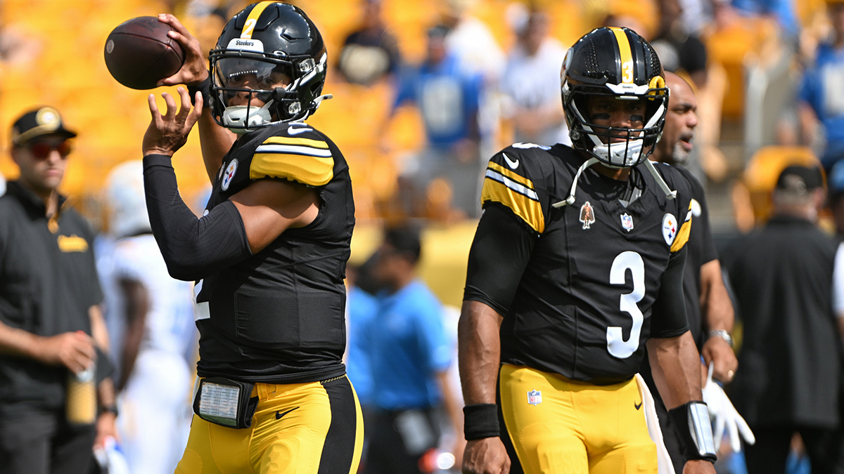 Pittsburgh Steelers quarterback Justin Fields (2) warms up next to quarterback Russell Wilson (3) before a game against the Los Angeles Chargers at Acrisure Stadium.