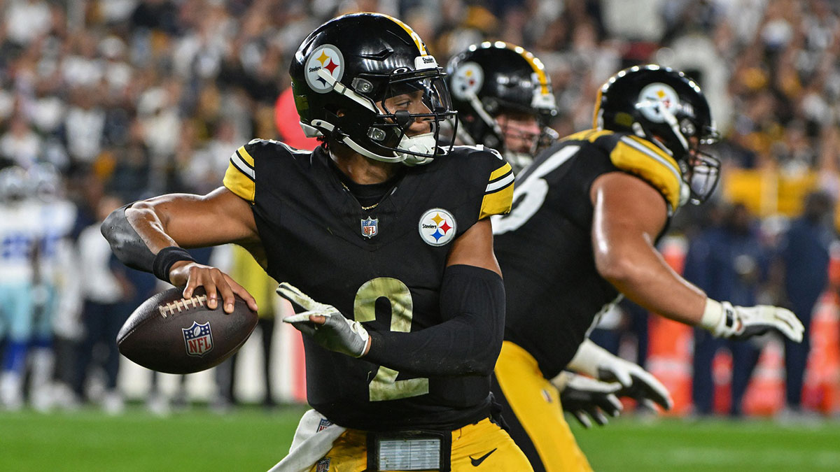 Oct 6, 2024; Pittsburgh, Pennsylvania, USA; Pittsburgh Steelers quarterback Justin Fields (2) throws a pass against the Dallas Cowboys during the first quarter at Acrisure Stadium.