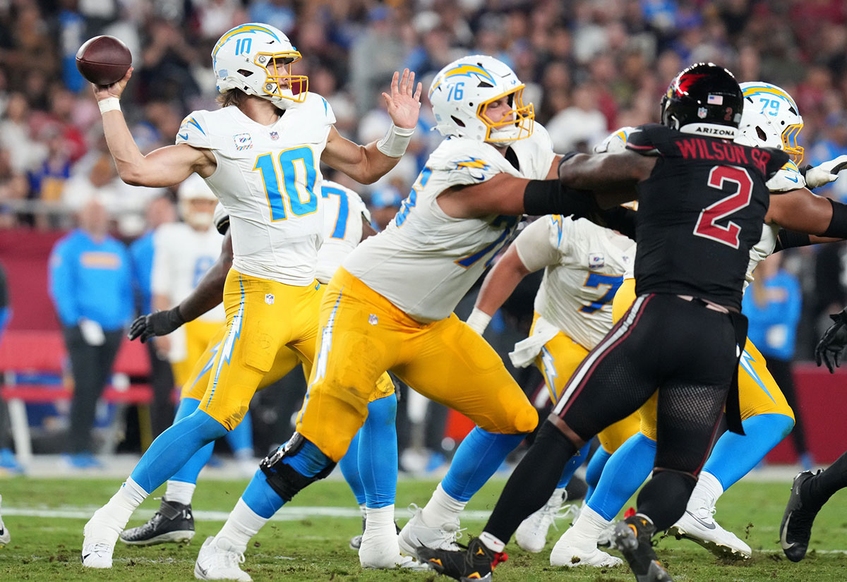 Los Angeles Chargers quarterback Justin Herbert (10) throws the ball against the Arizona Cardinals at State Farm Stadium.
