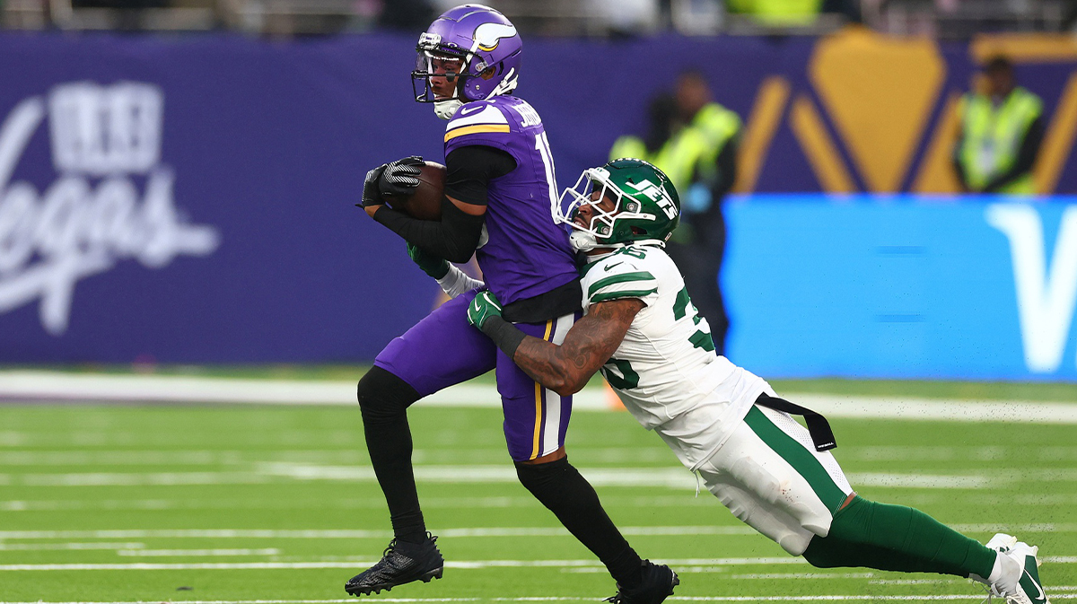 New York Jets defensive back Chuck Clark (36) tackles Minnesota Vikings Wide Receiver Justin Jefferson (18) in the 4th Quarter at Tottenham Hotspur Stadium
