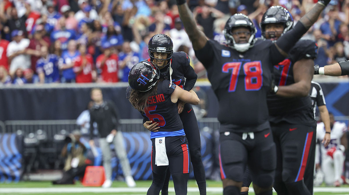 Houston Texans place kicker Ka'imi Fairbairn (15) celebrates with place holder Tommy Townsend (6) after kicking a field goal with time expiring as the Texans defeated the Buffalo Bills at NRG Stadium.
