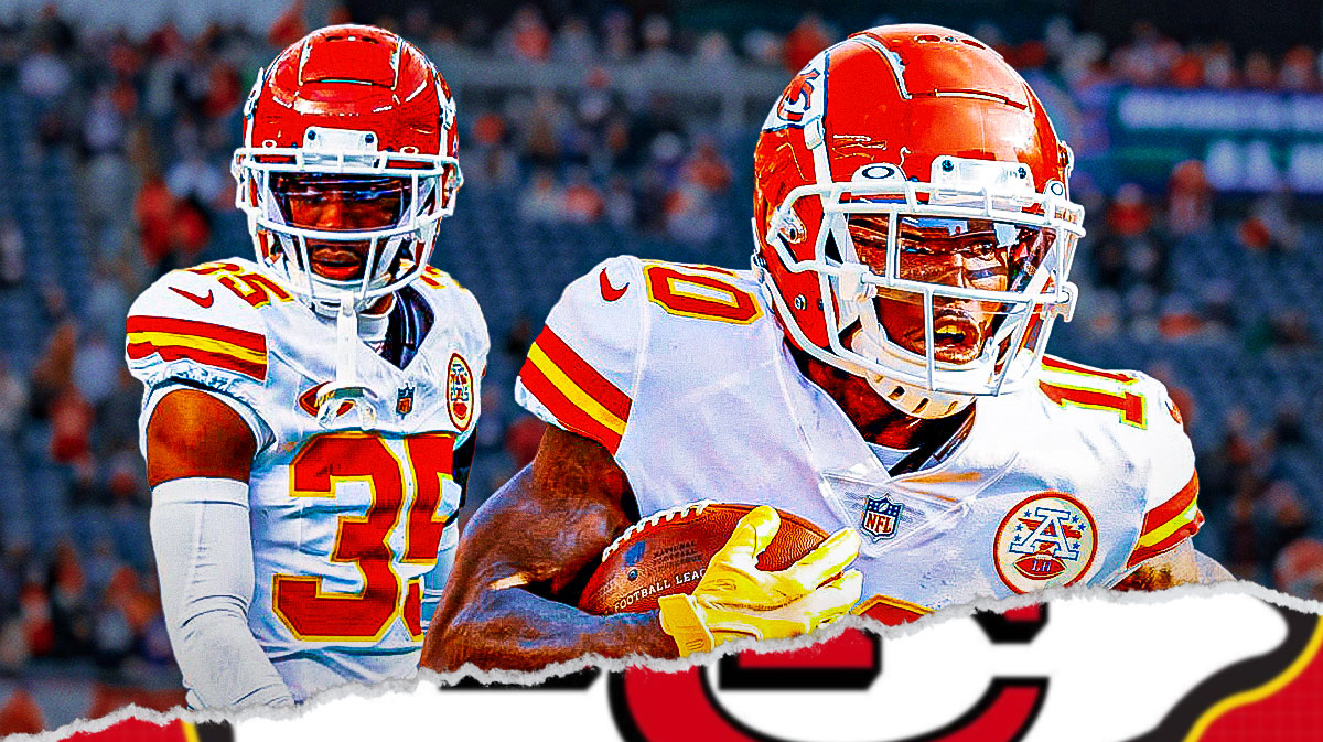Chiefs corner back Jaylen Watson next the Chiefs logo