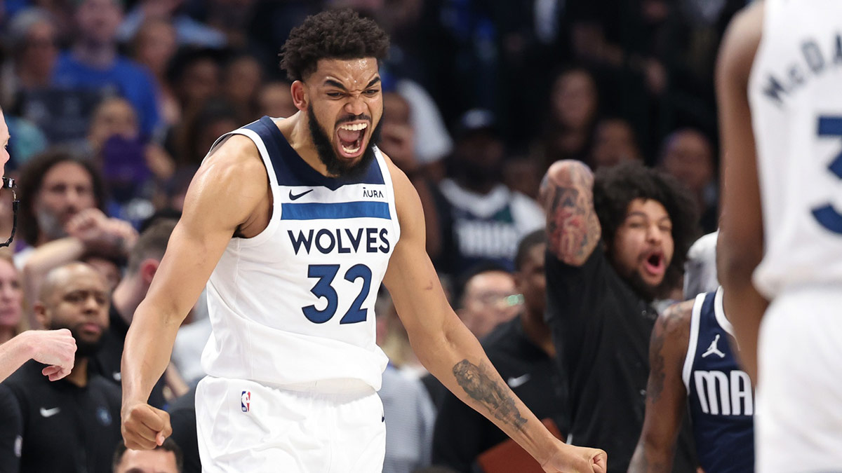 Minnesota Timberwolves center Karl-Anthony Towns (32) reacts during the fourth quarter against the Dallas Mavericks in game four of the western conference finals for the 2024 NBA playoffs at American Airlines Center.